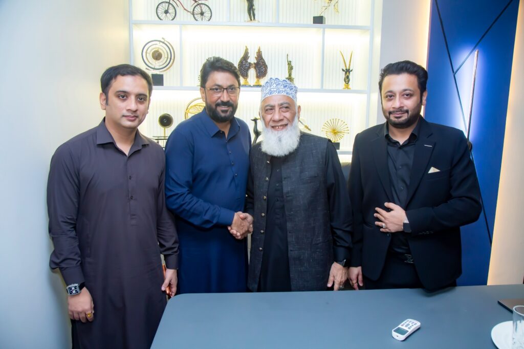 Guests attend the inauguration of AquaOrange Pakistan's new office at Roshan Trade Centre in Karachi.