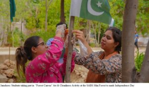 Students and faculty creating artwork during the Forest Canvas Independence Day event at SABS University Jamshoro.