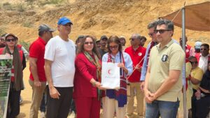 Pakistan Red Crescent Sindh volunteers distribute seed balls during a climate action drive