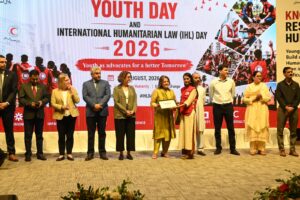 PRCS youth volunteers and officials attend a humanitarian ceremony in Islamabad.