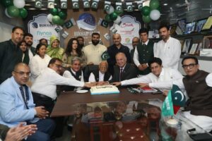 Bukhari Group Chairman Muhammad Rafiq Khan and business partners celebrate Pakistan Independence Day in Karachi.