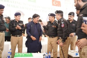 Ali Hassan Zardari and prison officials attend Pakistan Independence Day flag ceremony at Central Prison Karachi.