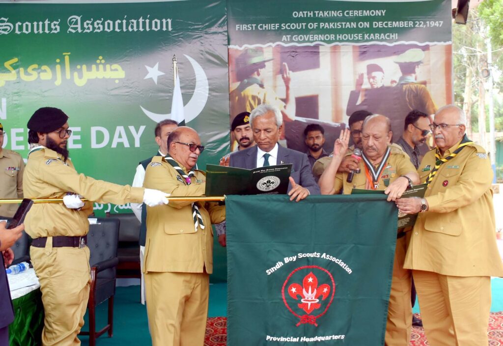 Sindh Governor Nihal Hashmi and scouts plant trees at Gulistan Scouts Training Centre in Karachi.