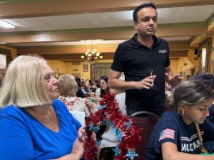 Assad Mujtaba meets community members at St. John Kanty Church in Clifton