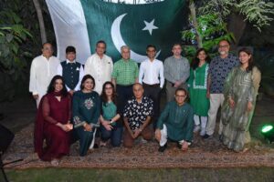 Rotary Club of Karachi members celebrating Pakistan Independence Day at a fellowship dinner