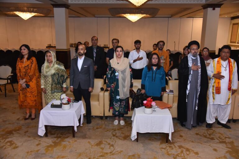 Dr Fozia Hameed addressing an interfaith forum on children’s welfare in Karachi