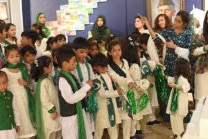 Consul General of Türkiye viewing artworks at Ishq-e-Zameen Art Exhibition in Karachi