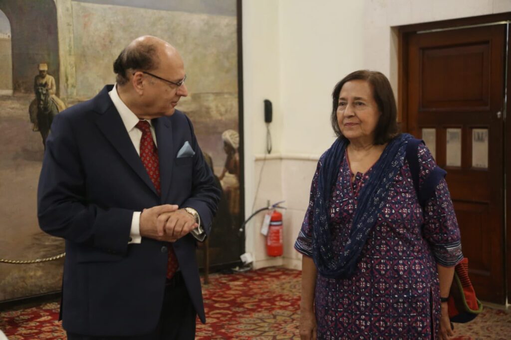 Sirajuddin Aziz and Ameena Saiyid signing an agreement to publish Wings of Destiny.