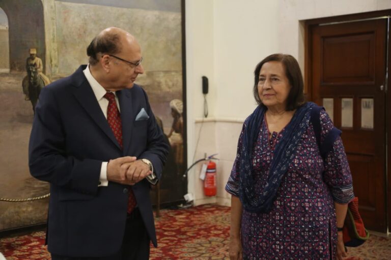 Sirajuddin Aziz and Ameena Saiyid signing an agreement to publish Wings of Destiny.