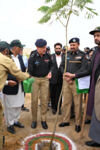 Officials launch a tree plantation project on Shahrah-e-Bhutto in Karachi to honour Sindh Police martyrs.