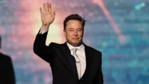 Elon Musk speaking as SpaceX earnings highlight rising AI investment and Starlink growth.