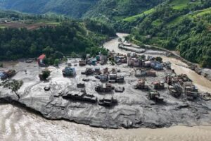 Landslide lake overflowing near the Nepal-China border after deadly Nepal floods.
