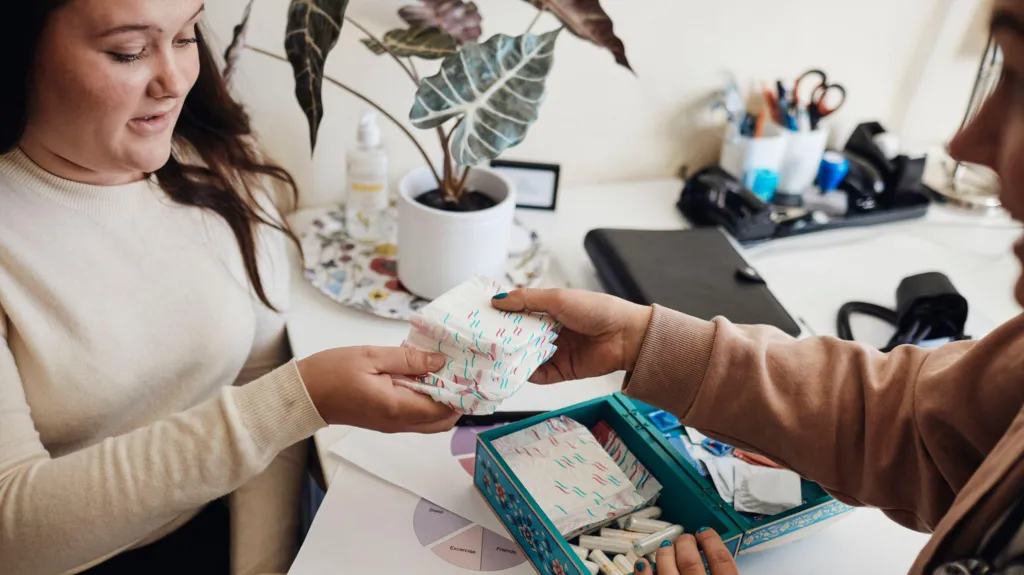 Young women discussing periods, hormones and menstrual health