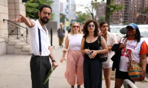 Asad Dandia conducts a guided tour about New York Muslim communities in Harlem.