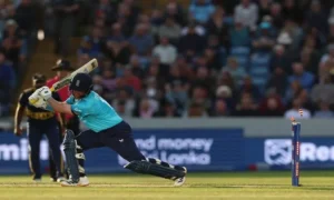 Kusal Mendis celebrates after scoring a century against England at Headingley