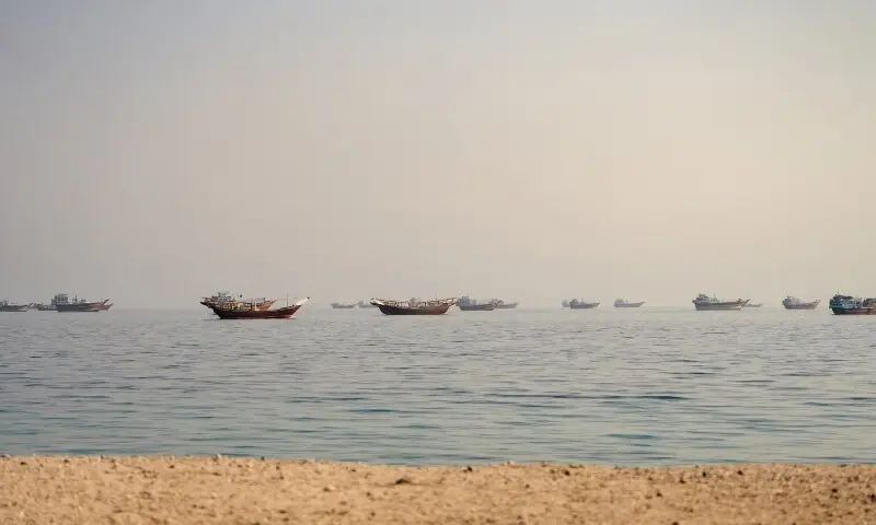 Vessels near the Strait of Hormuz as US and Iran discuss a possible phased diplomatic deal.