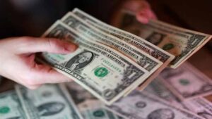US dollar news showing currency markets, Treasury yields and Federal Reserve rate-hike expectations.