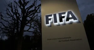 FIFA president Gianni Infantino and UEFA officials amid World Cup investor dispute.