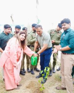 Participants taking part in a tree plantation drive to promote environmental awareness in Pakistan.