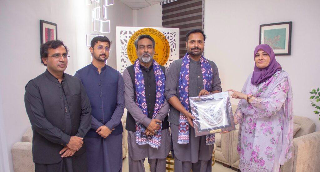 SABS University students display Defence Day artwork at a youth art exhibition in Jamshoro.