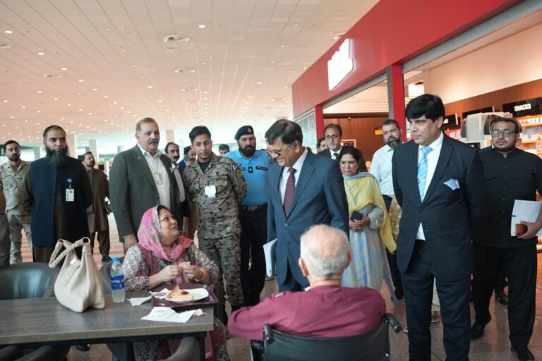 Federal Ombudsman inspection team during a visit to Islamabad International Airport.