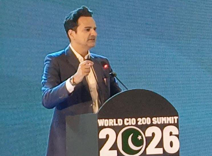 Ali Rashid addresses technology leaders at the World CIO 200 Summit in Karachi.