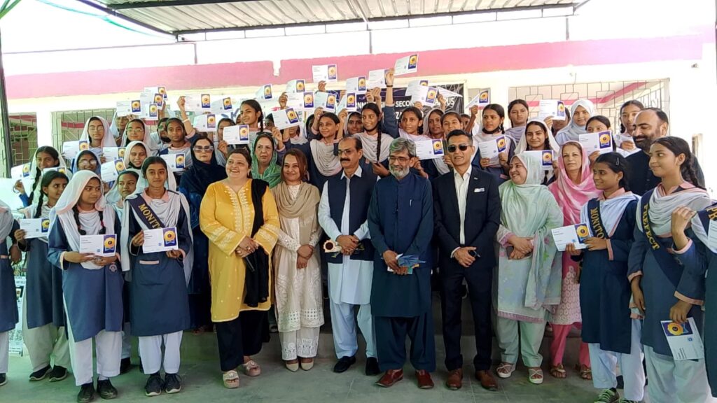 SKY Initiative students and guests attend a digital empowerment and youth entrepreneurship ceremony in Azmabad Karachi.
