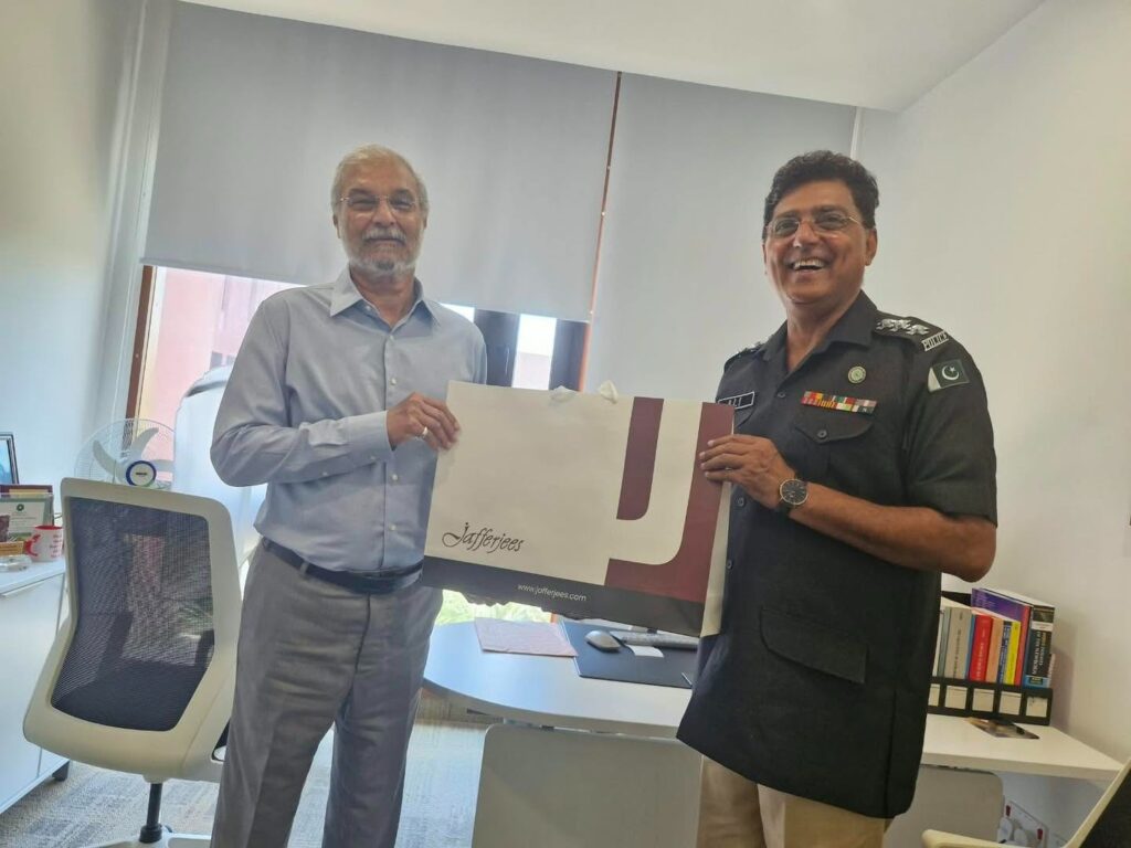Ali Suhag and Prof. Dr. Sajid Bhatti Soofi during a road safety awareness session at Aga Khan University Karachi