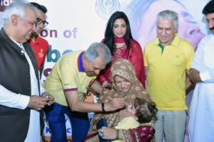 Officials and Rotary leaders at the inauguration of September SNIDs for polio vaccination in Karachi.