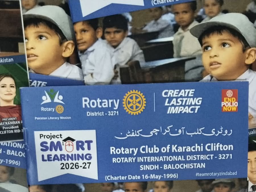 Rotary Club of Karachi Clifton activity book featuring numbers, alphabets, tracing and colouring activities.