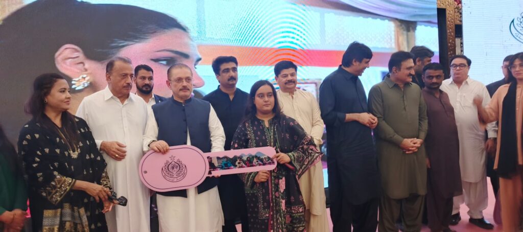 Women receive Pink Electric Scooters during a Sindh government ceremony in Mirpurkhas.