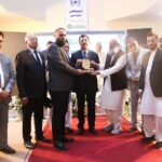 Yousaf Raza Gilani Presents Crest to SITE Association President