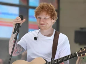 Ed Sheeran performing during his Loop tour after opening acts withdraw from remaining dates.
