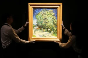 Van Gogh’s Chestnut Trees in Blossom painting displayed in Hong Kong before its expected $180 million New York auction.