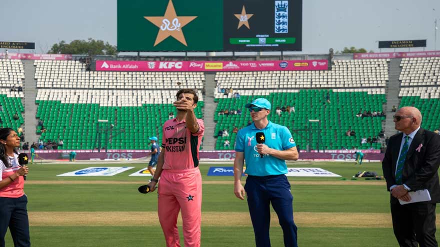 Pakistan vs England cricket match at Gaddafi Stadium in Lahore during Pink Day breast cancer awareness activities.