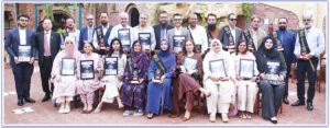 Rotary District 3271 leaders present the Legendary Teachers Awards 2026 during a World Teachers’ Day ceremony in Karachi.