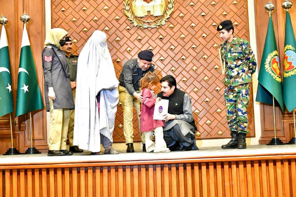 KP Governor Faisal Karim Kundi distributes plot allotment letters to families of 54 police martyrs at Governor House Peshawar