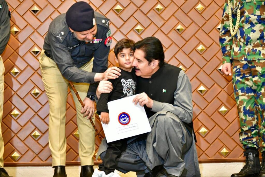 KP Governor Faisal Karim Kundi distributes plot allotment letters to families of 54 police martyrs at Governor House Peshawar