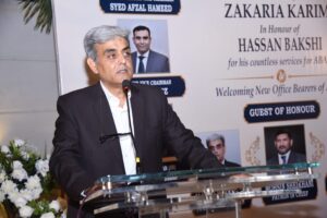 Hasan Bakhshi discusses SBCA files, Nasla Tower and construction-sector reforms at a Karachi event.