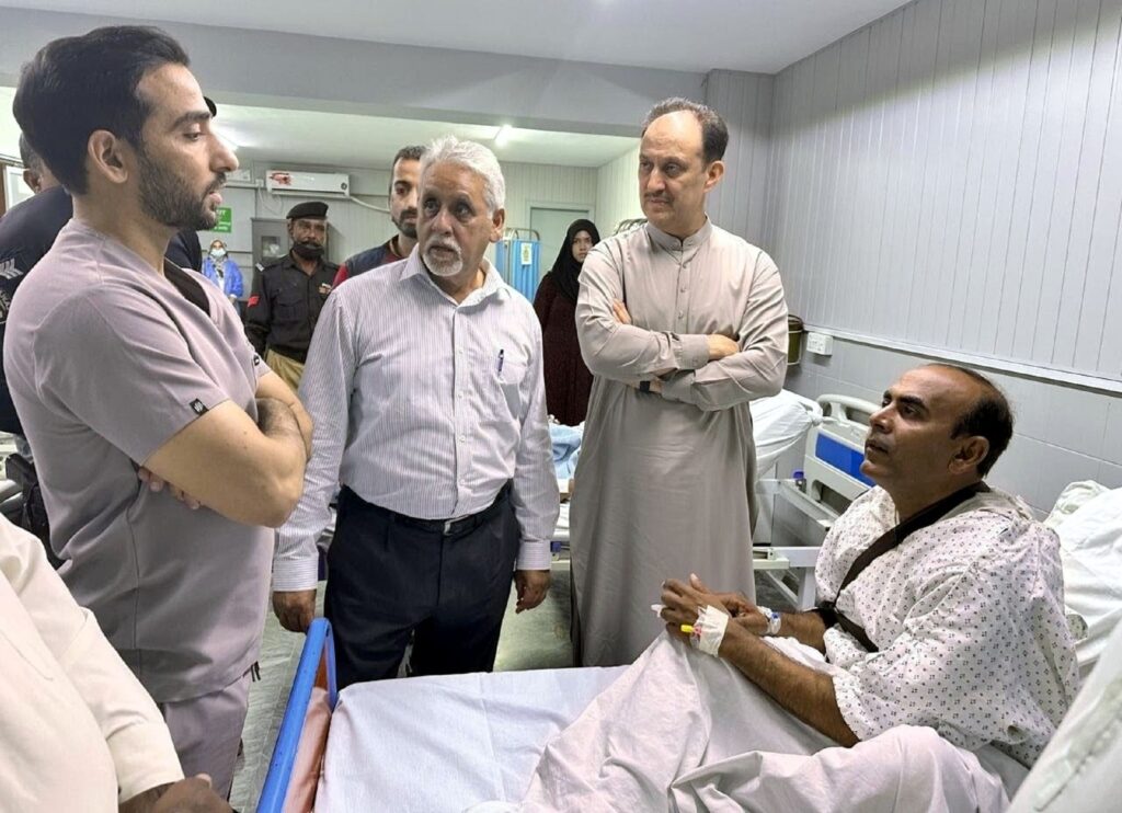 PEBS Hospital visit by Additional IGP Karachi Azad Khan to check on injured police personnel.