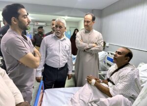 PEBS Hospital visit by Additional IGP Karachi Azad Khan to check on injured police personnel.