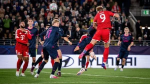 Viking players celebrate after holding Bayern Munich to a 3-3 Champions League draw.