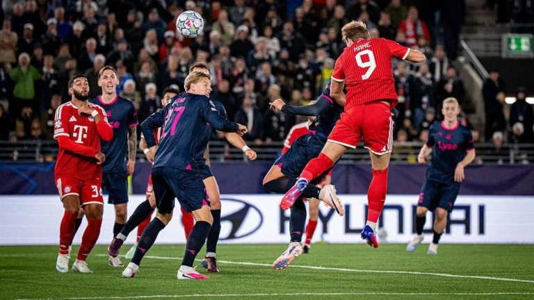 Viking players celebrate after holding Bayern Munich to a 3-3 Champions League draw.