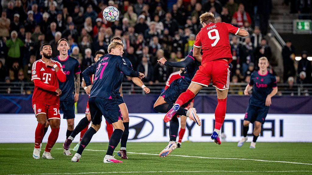 Viking players celebrate after holding Bayern Munich to a 3-3 Champions League draw.