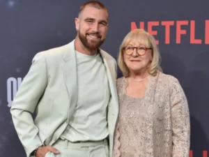 Travis Kelce and Donna Kelce amid controversy over old social media posts allegedly linked to the NFL star.