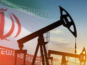 Oil tanker sailing through the Strait of Hormuz amid rising oil prices and regional tensions.