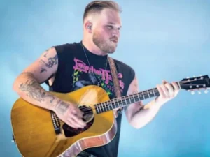 Zach Bryan wearing a Free Palestine shirt at Gillette Stadium