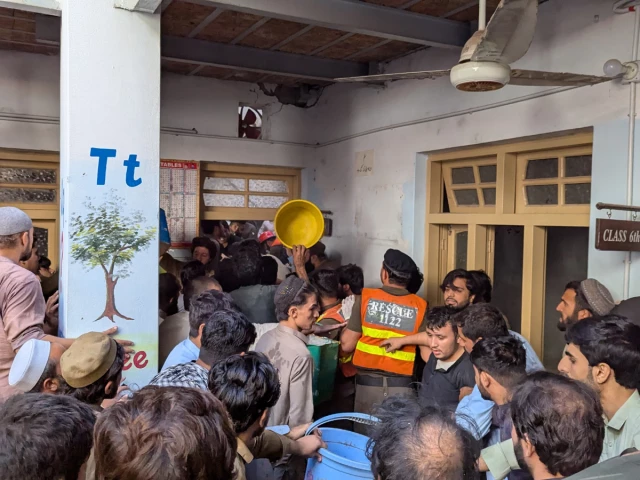 Peshawar School roof collapse rescue operation following the deaths of children and teachers.